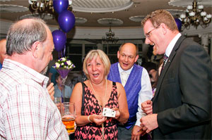 Wedding Close-up Magician Paul Sunderland entertaining an intimate group and the wedding reception.