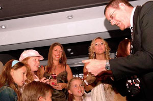 Wedding Magician Paul Sunderland Entertains a group of Wedding Guests